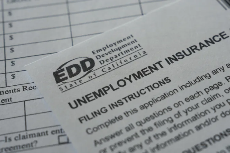 US filings for jobless benefits rise to 197,000 last week, but layoffs remain historically low